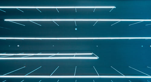 Full frame shot of illuminated lights on wall
