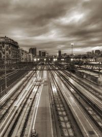 High angle view of railroad tracks against sky in city