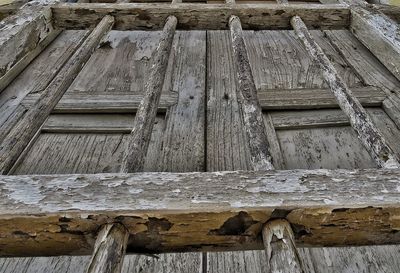 Low angle view of abandoned roof