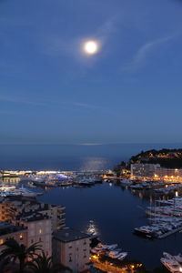 High angle view of illuminated harbor at night