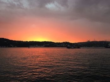 Scenic view of sea against dramatic sky