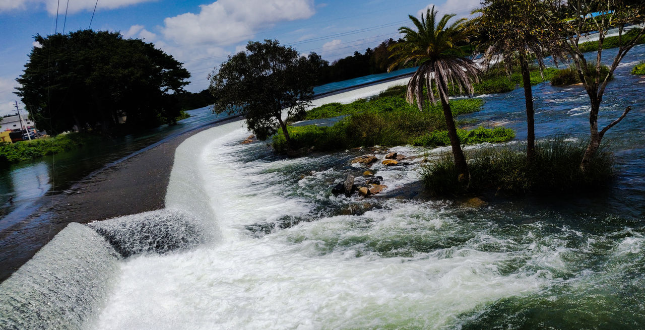 SCENIC VIEW OF WATERFALL IN SEA