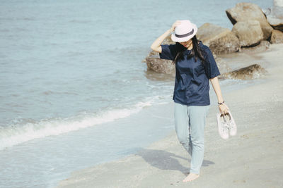 Man walking on beach