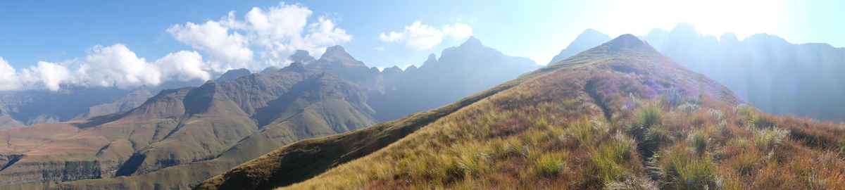 Panoramic view of mountain range against sky