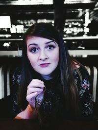 Close-up portrait of young woman