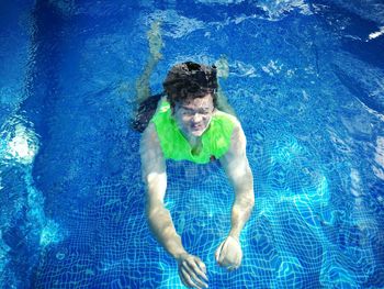 Portrait of man in swimming pool