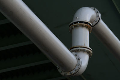 Low angle view of pipeline in factory