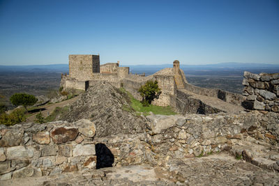 Old ruins against clear blue sky