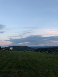 Scenic view of field against sky