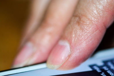 Close-up of person using mobile phone