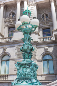 Low angle view of statue against building