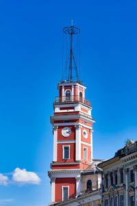 Low angle view of clock tower against sky