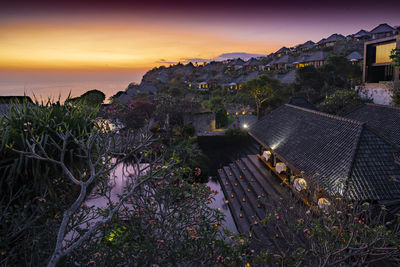 High angle view of city at sunset