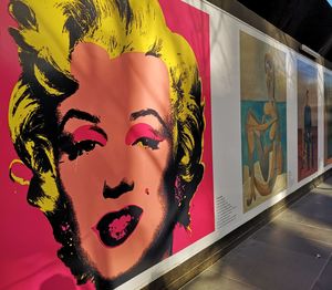 Midsection of woman painting on wall