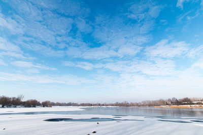 Scenic view of landscape against blue sky