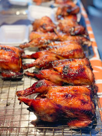 Close-up of meat on barbecue grill