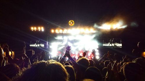 People enjoying music concert