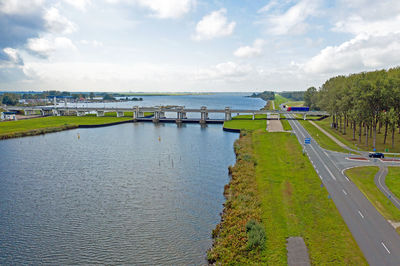 High angle view of road by sea against sky