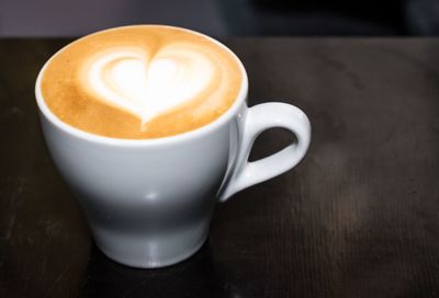 Close-up of cappuccino on table