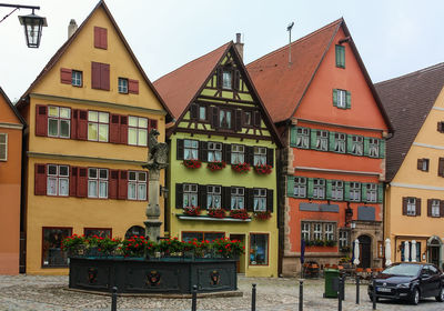 Residential buildings against sky in city