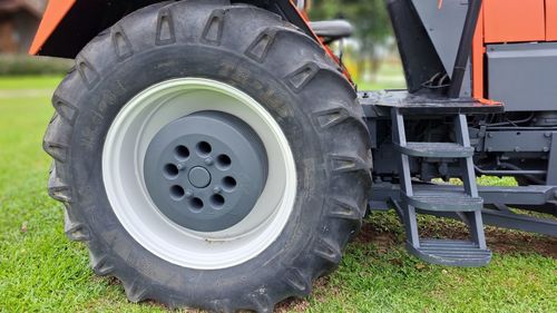 Close-up of tractor on field