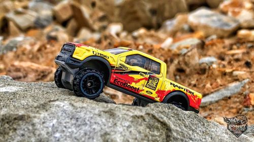 Close-up of toy car on rock