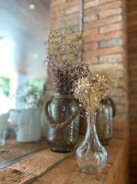 Close-up of flower vase on table