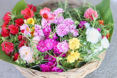 High angle view of multi colored flowers in basket