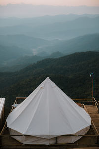 Tent on mountain against sky