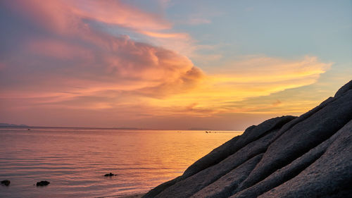 Scenic view of sea against sky at sunset