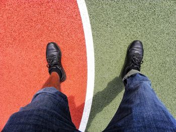 Low section of man standing outdoors