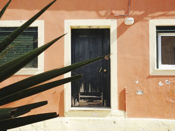 Orange house in a greek village