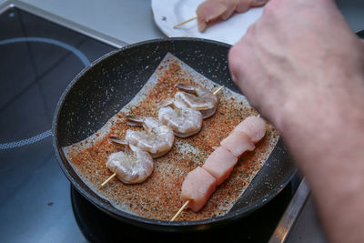 High angle view of person preparing food