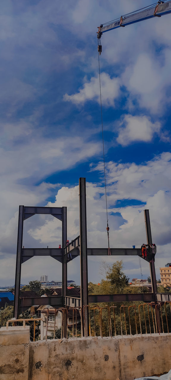 sky, cloud, blue, nature, construction, architecture, built structure, construction site, no people, day, outdoors, industry, low angle view, construction industry, mast, tower