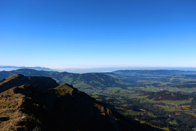 Scenic view of mountains against clear sky