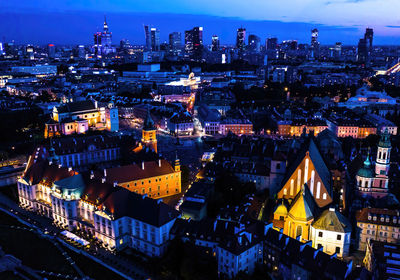Warsaw high aerial view of historic architecture buildings in old town market square at night