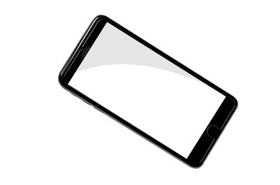 Close-up of mobile phone against white background