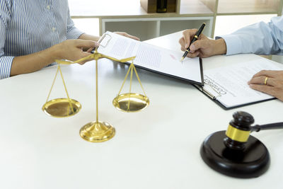 Two people on table