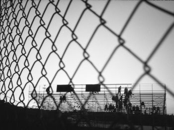 Detail shot of fence against clear sky