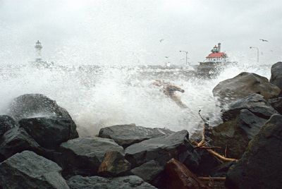 Waves splashing on rocks