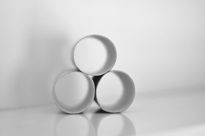 Close-up of wineglass against white background