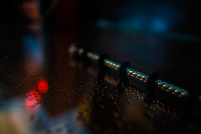 Close-up of telephone booth on table