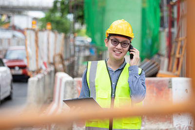 Man working on mobile phone