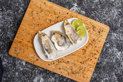 High angle view of fish in plate on table