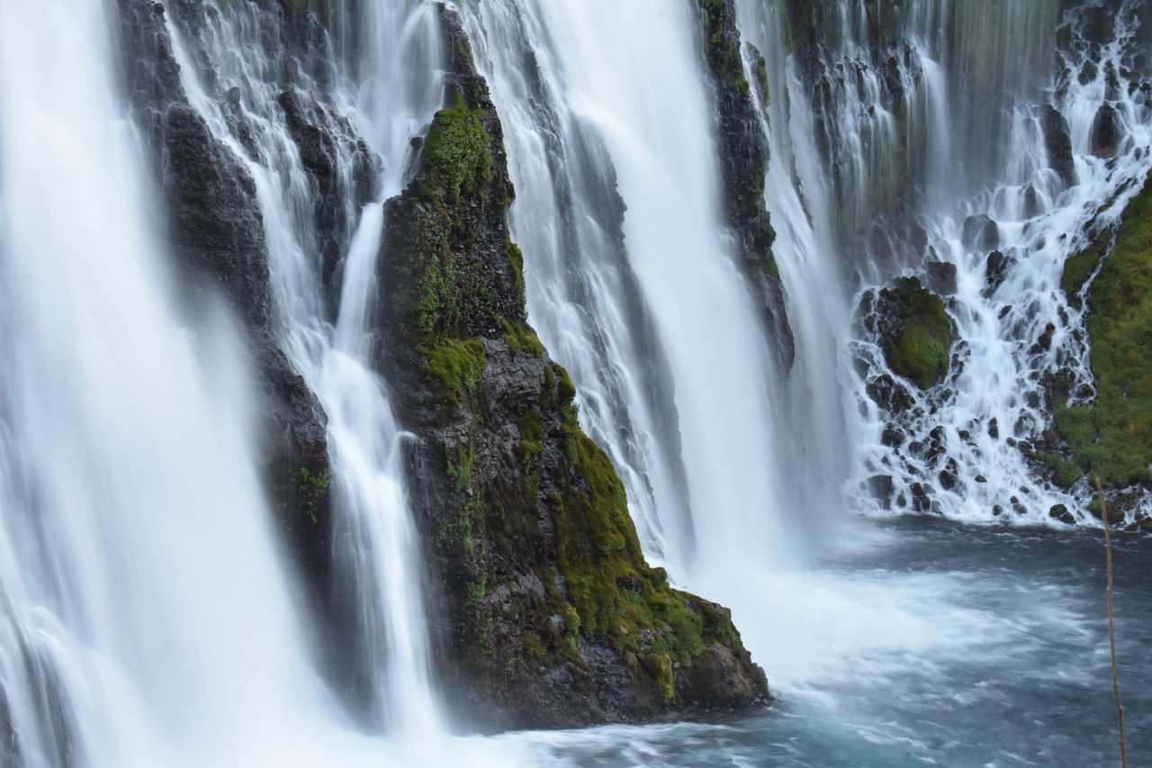 waterfall, water, scenics - nature, beauty in nature, body of water, motion, environment, nature, long exposure, rock, water feature, land, watercourse, travel destinations, blurred motion, tourism, no people, flowing water, travel, outdoors, water resources, plant, non-urban scene, splashing, forest, landscape, flowing, speed, power in nature, river, rock formation, tree, sports, falling, idyllic