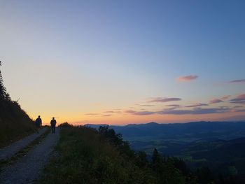 Scenic view of mountains against sky during sunset