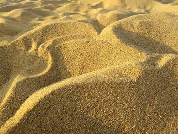High angle view of heart shape on sand