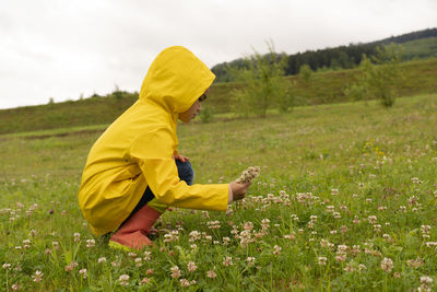 Side view of man on field