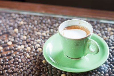 Close-up of coffee cup on table