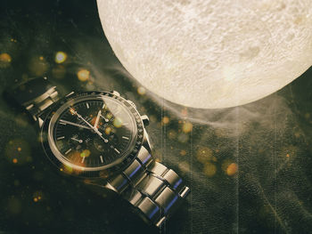 High angle view of clock on table